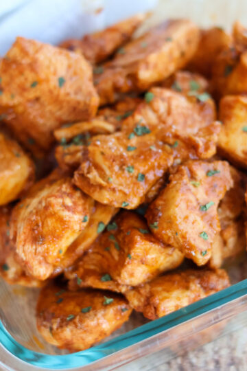 Dish full of baked chipotle chicken chunks.