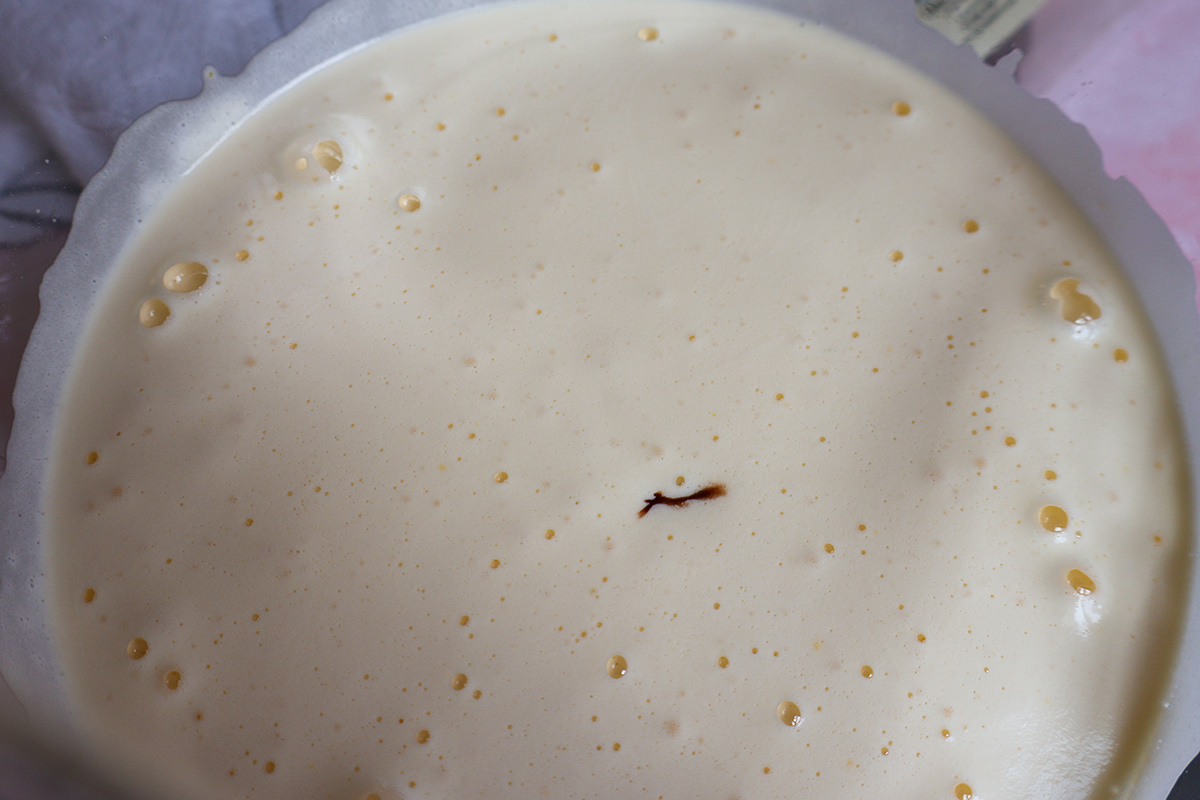 Whiske eggs and sugar in a mixing bowl.