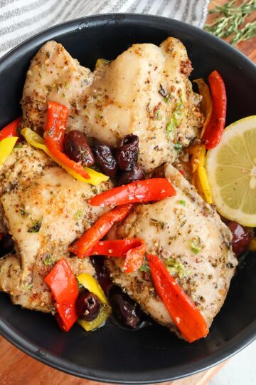 Overhead shot of plateful of baked chicken thighs.