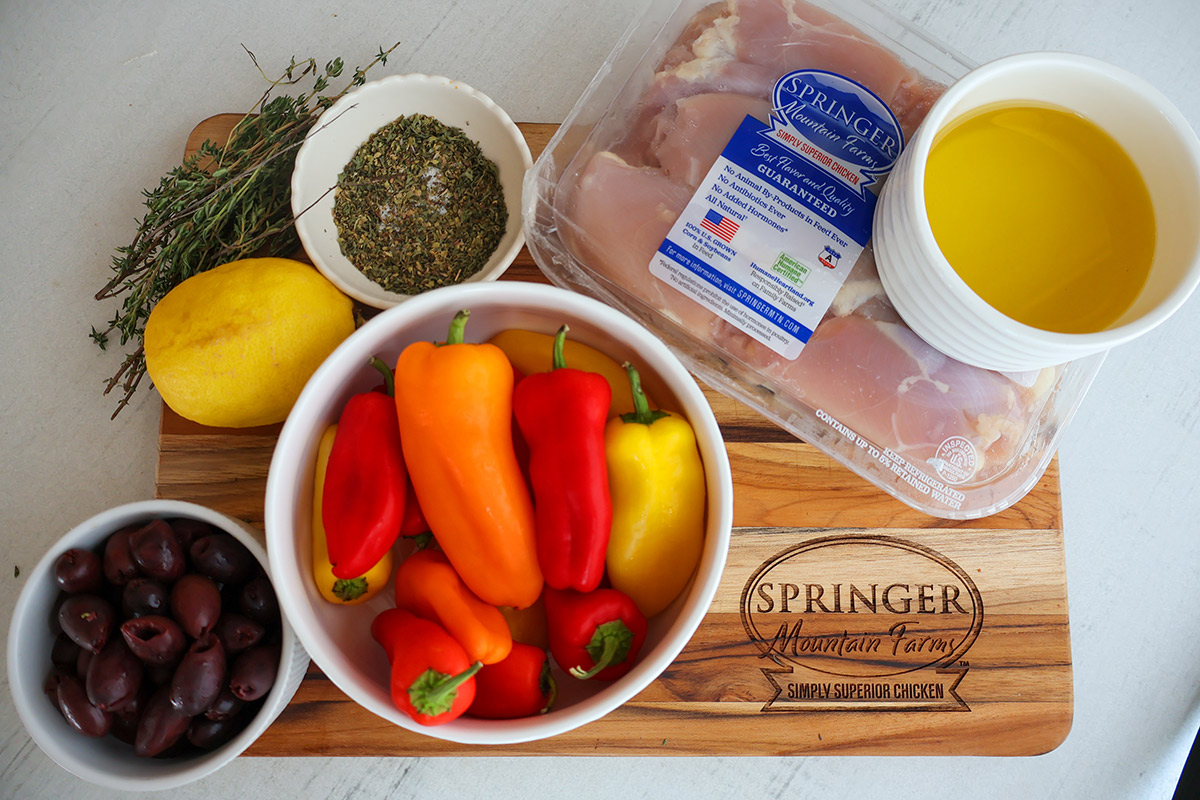 Overhead shot of individual sheet pan chicken ingredients.