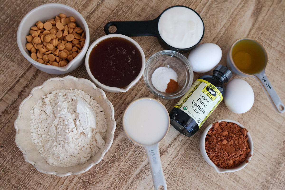 An overhead shot of muffn ingredients in individual bowls.