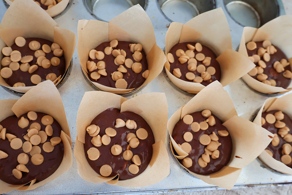 An overhead shot of unbaked muffins.