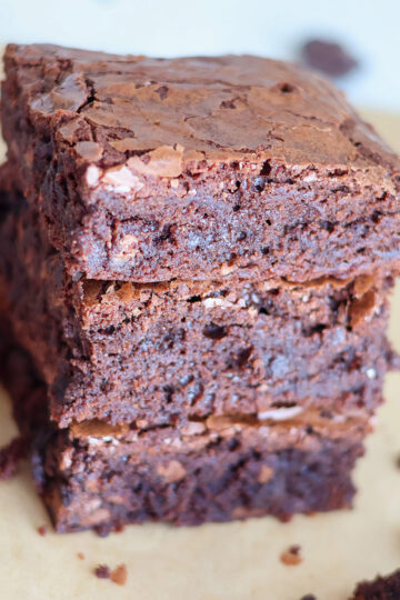 A stack of three nut free brownies.