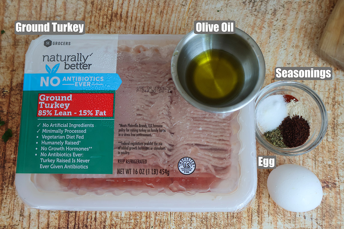 Package of ground turkey, and egg, and bowls with seasonings.