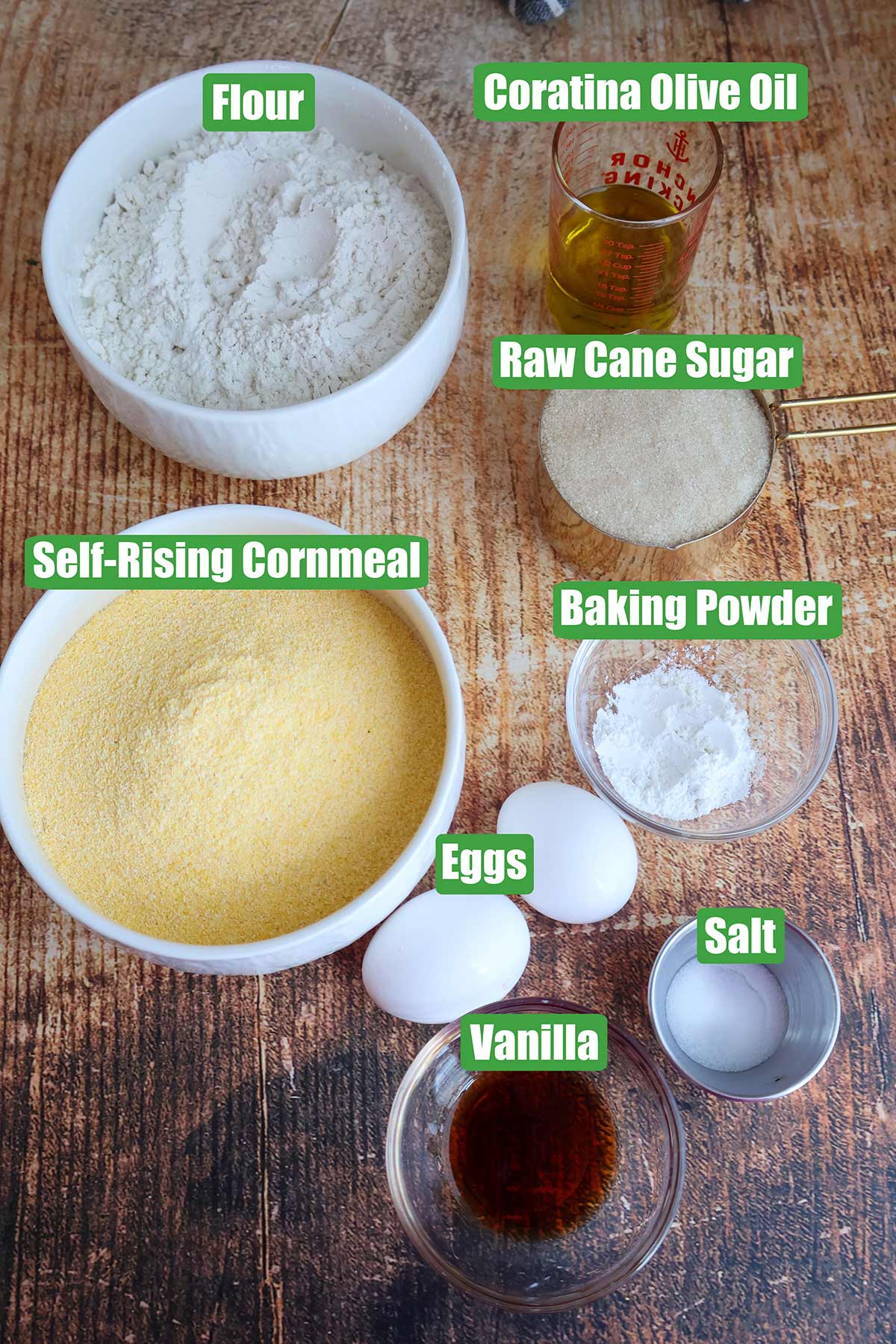 Individual corn muffin ingredients in bowls. 