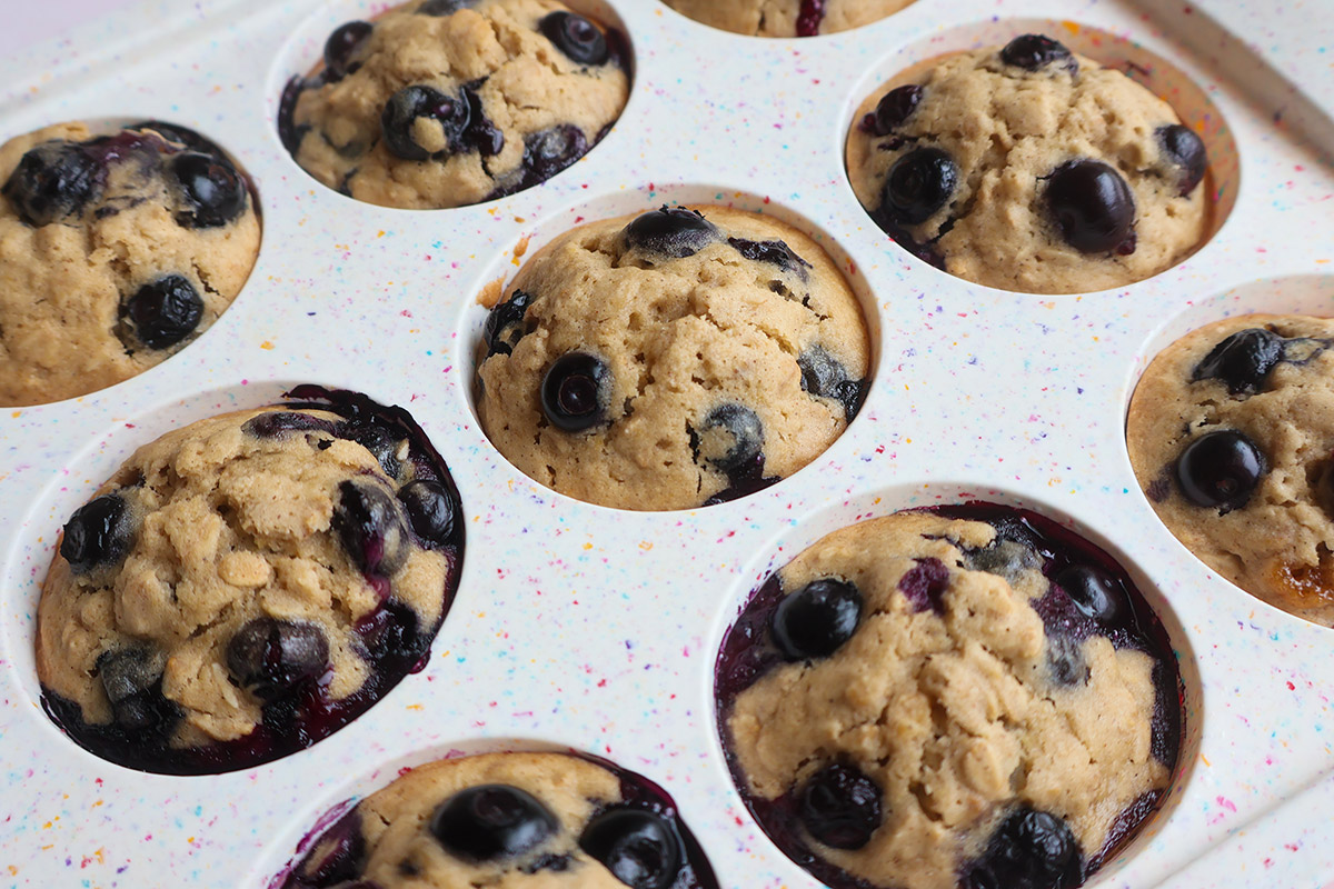 Baked blueberry muffsin in a cupcake pan.