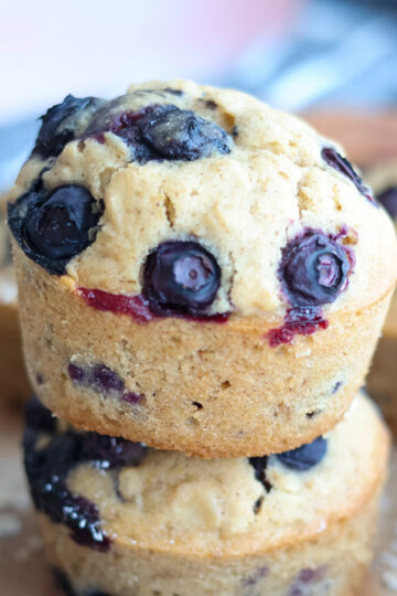 A stack of two blueberry muffins.